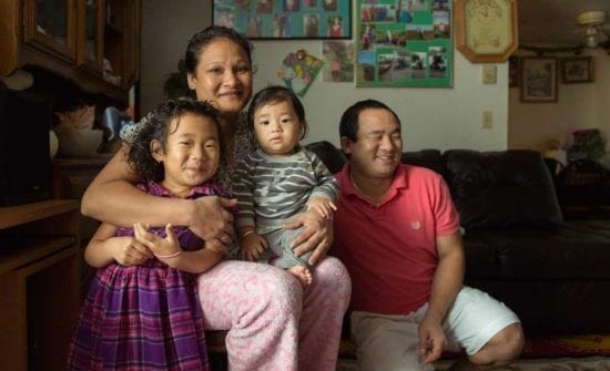 Nepali family of parents and young children (ES)