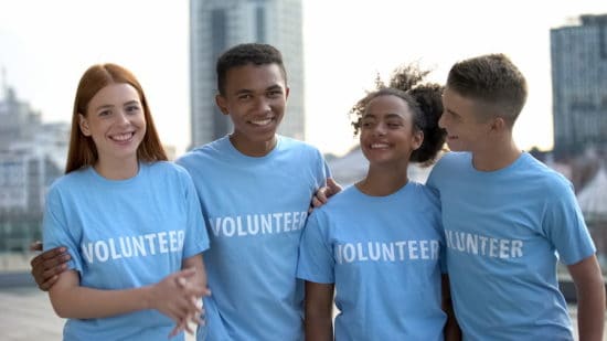 teens in volunteer tshirts