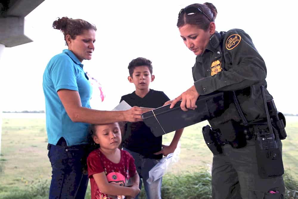 family with female border patrol