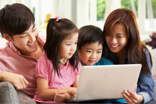 Chinese family with computer