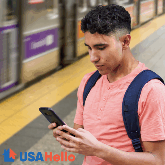 man looking at USAHello immigration guide on phone